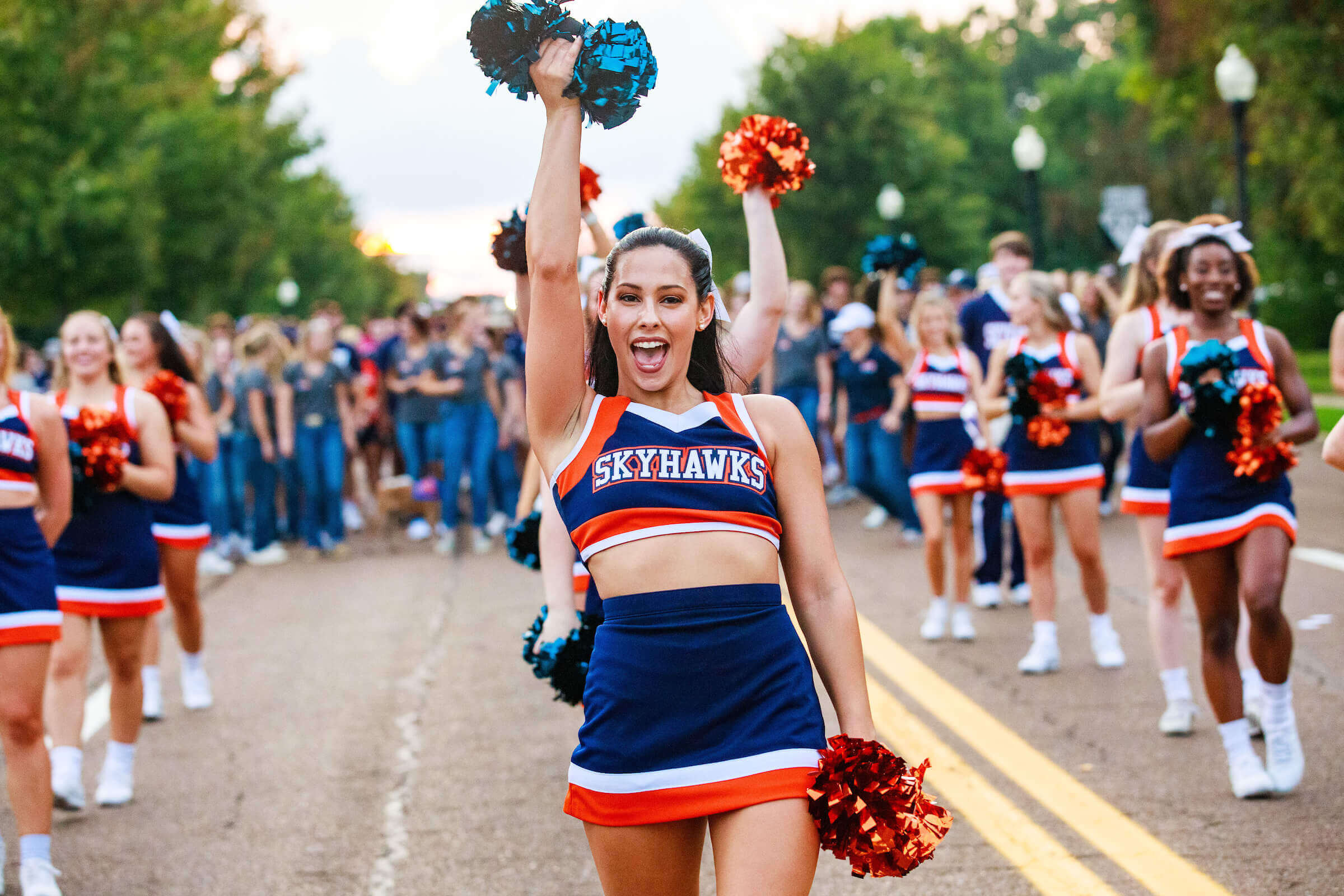Skyhawk cheerleaders lead a convoy of UT Martin students in our annual downtown festival parade.