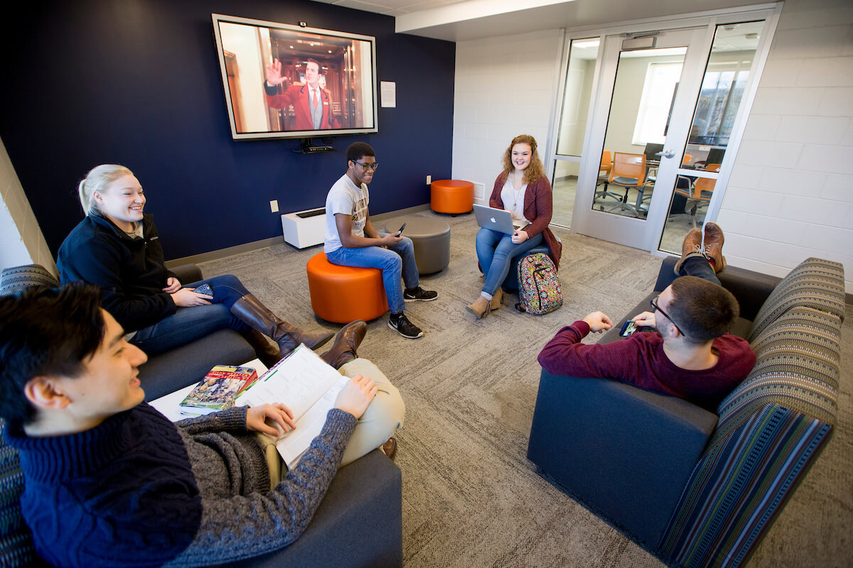 Students convene for a study session in Cooper Hall; a living learning community where students with shared academic majors or lifestyle interests live and collaborate.